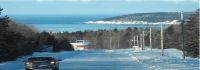  winter driving lake in background